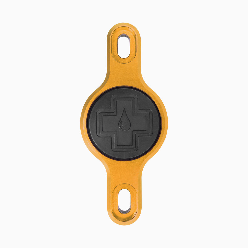Suport Apple AirTag pentru cadru Muc-Off Secure Tag Holder V2 Gold