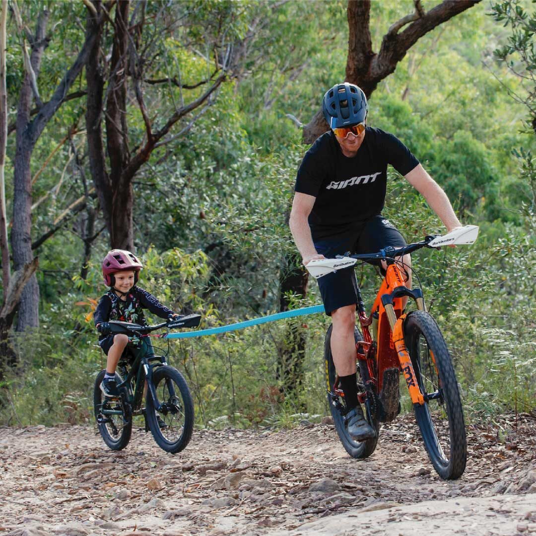 tow rope bike seat in woods with parent 02a26cae e1d9 4640 acc6 9175c39bcdf5 1024x1024@2x